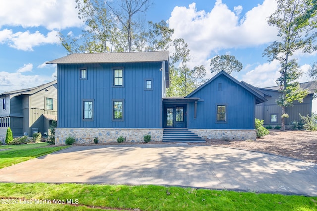 250 Old Jay Rd, Eclectic, AL 36024 - modern farmhouse featuring board and batten siding and a shingled roof