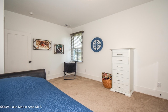 unfurnished bedroom with light carpet