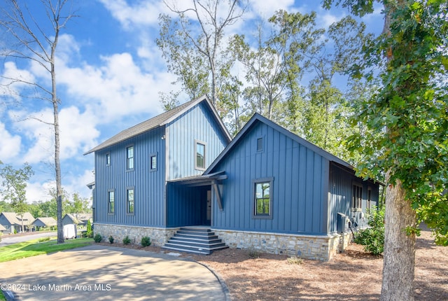 250 Old Jay Rd, Eclectic, AL 36024 - modern farmhouse style home with board and batten siding and stairs