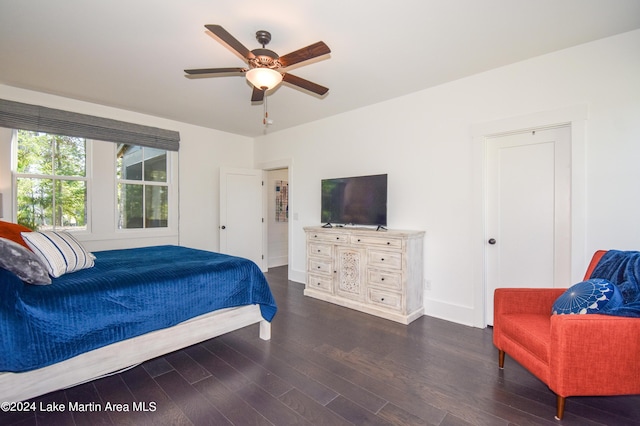 bedroom featuring ceiling fan and dark wood-type flooring