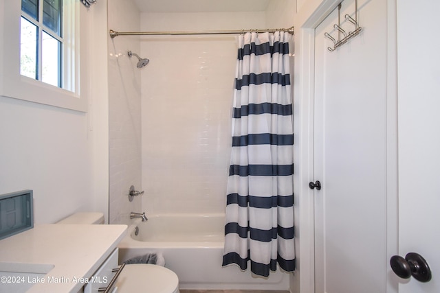 250 Old Jay Rd, Eclectic, AL 36024 - bathroom featuring shower / bath combo with shower curtain and vanity