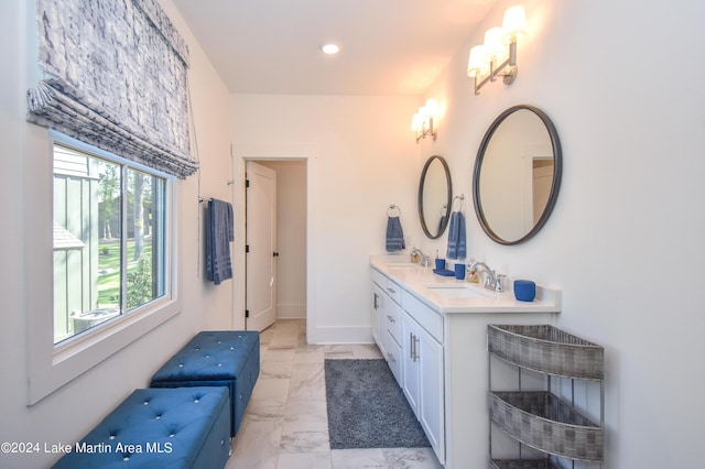 250 Old Jay Rd, Eclectic, AL 36024 - full bath featuring marble look tiles, double vanity, and recessed lighting
