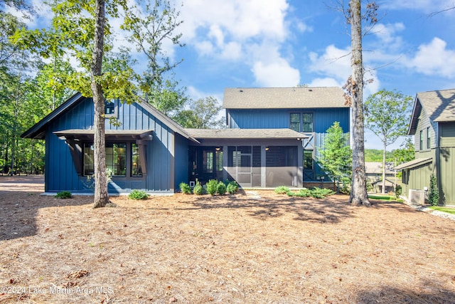 250 Old Jay Rd, Eclectic, AL 36024 - back of house featuring a sunroom and a shingled roof