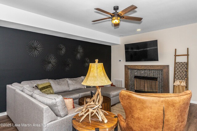 kitchen with backsplash, dark wood-style floors, stainless steel appliances, baseboards, and custom exhaust hood