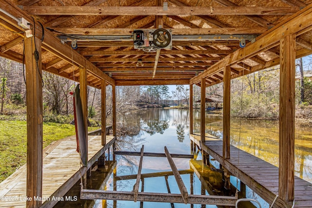 view of dock with a water view and boat lift