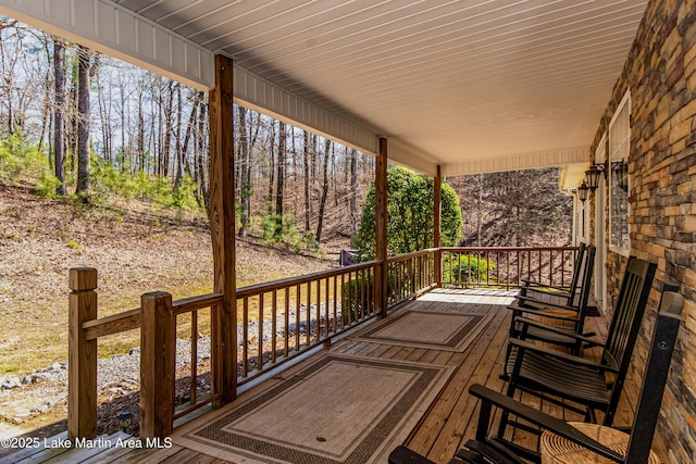 wooden deck featuring a porch