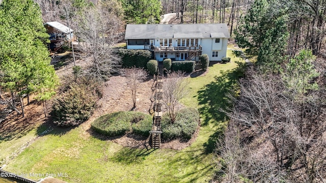 aerial view featuring a view of trees