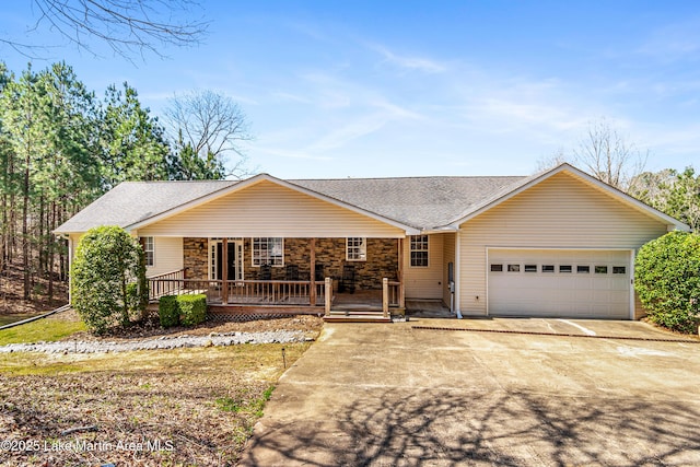 single story home featuring a porch, concrete driveway, a garage, and roof with shingles