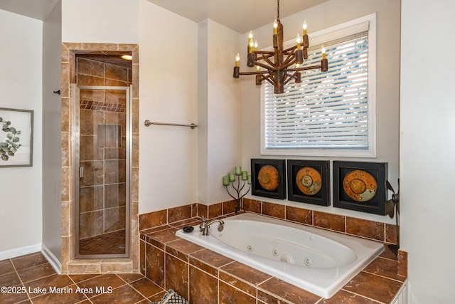 bathroom with tile patterned floors, a shower stall, and a jetted tub