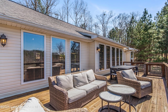 wooden deck with an outdoor hangout area