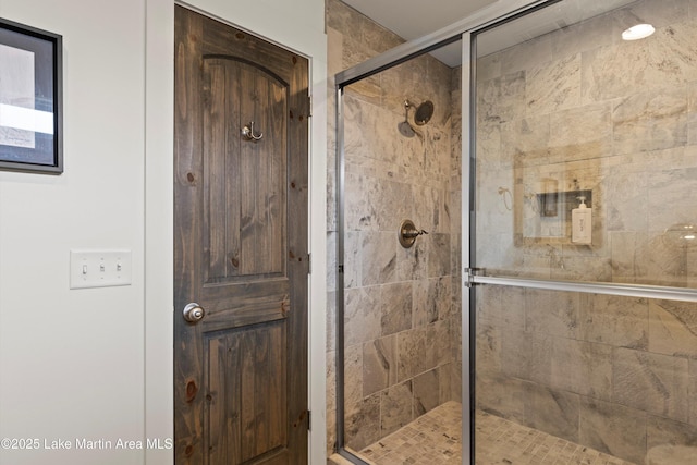 full bathroom featuring a stall shower