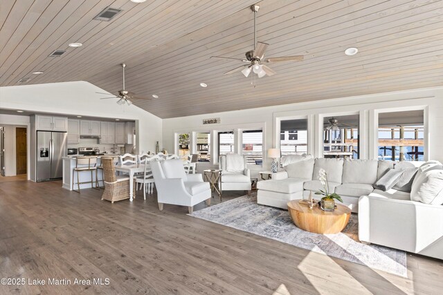 living area with a ceiling fan, wooden ceiling, wood finished floors, and visible vents