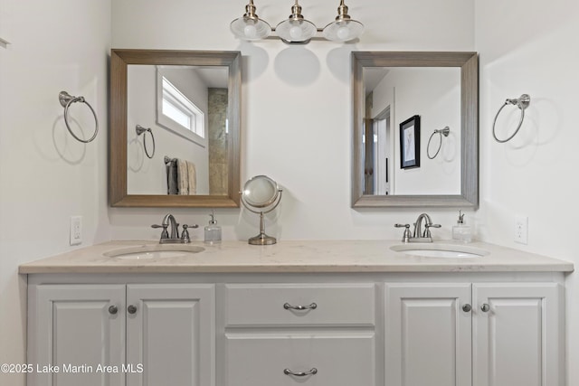 full bathroom featuring a sink and double vanity