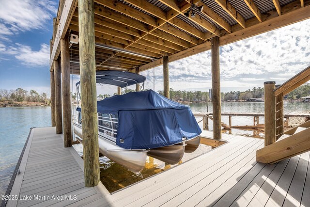 dock area featuring a water view and boat lift