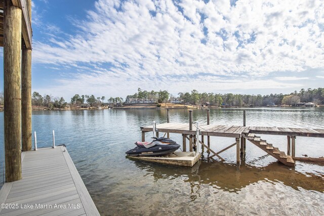 dock area featuring a water view