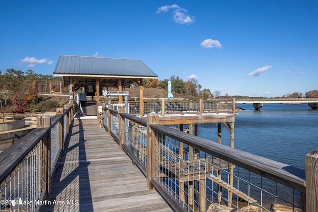 dock area with a water view