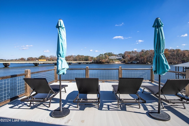 wooden terrace with a water view