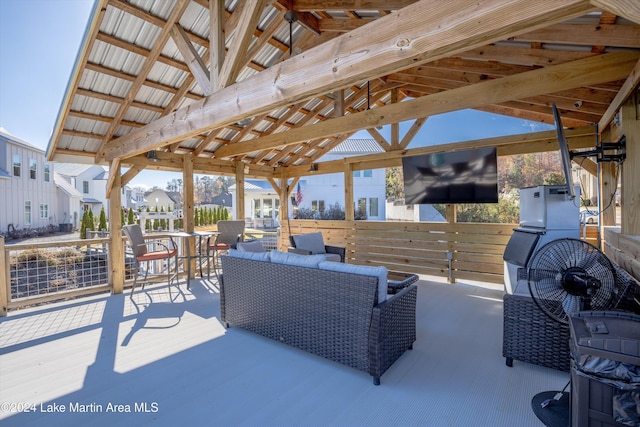 view of patio featuring a gazebo and an outdoor hangout area