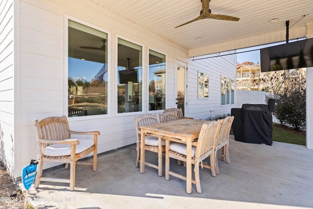 view of patio featuring ceiling fan