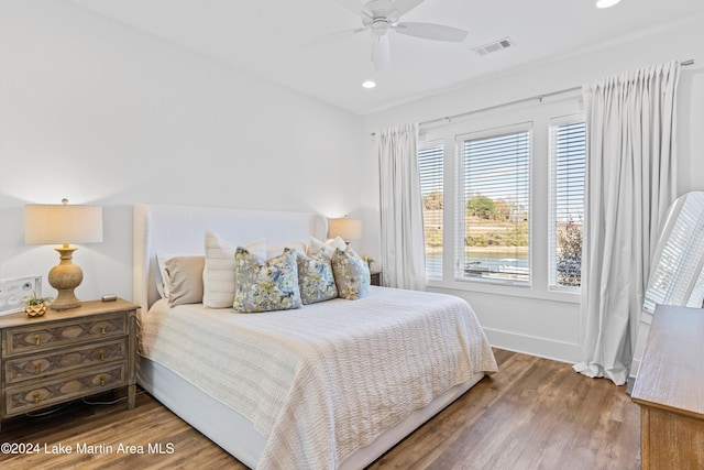 bedroom featuring ceiling fan and wood-type flooring