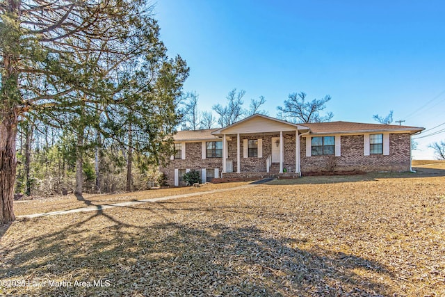 view of front of home with a front lawn and a porch