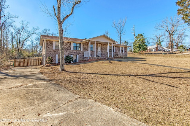 ranch-style home with covered porch