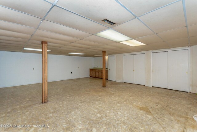 basement with a drop ceiling