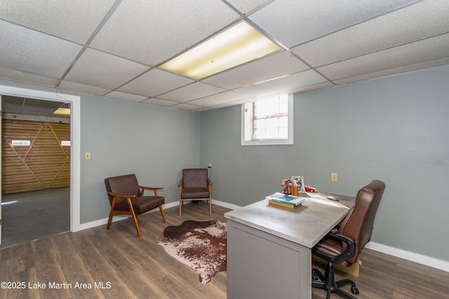 home office with dark wood-type flooring