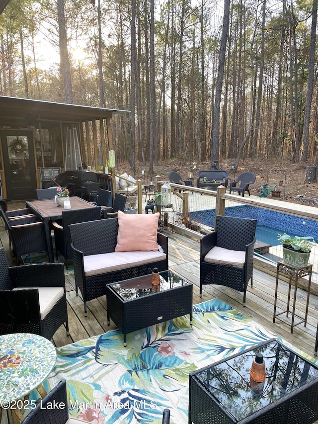 wooden deck with outdoor lounge area