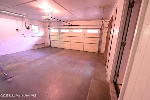 garage featuring a garage door opener