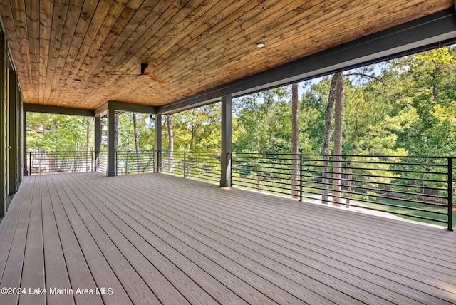 wooden terrace featuring ceiling fan