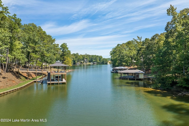 water view featuring a gazebo and a boat dock