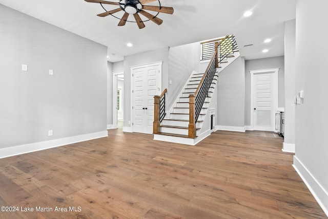 interior space with hardwood / wood-style flooring and ceiling fan