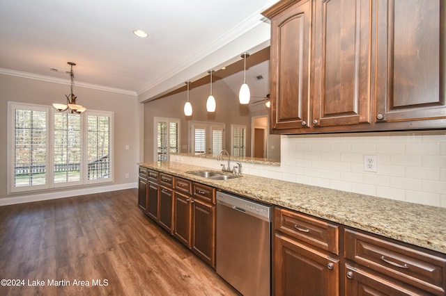 kitchen featuring dishwasher, dark hardwood / wood-style flooring, sink, and decorative light fixtures