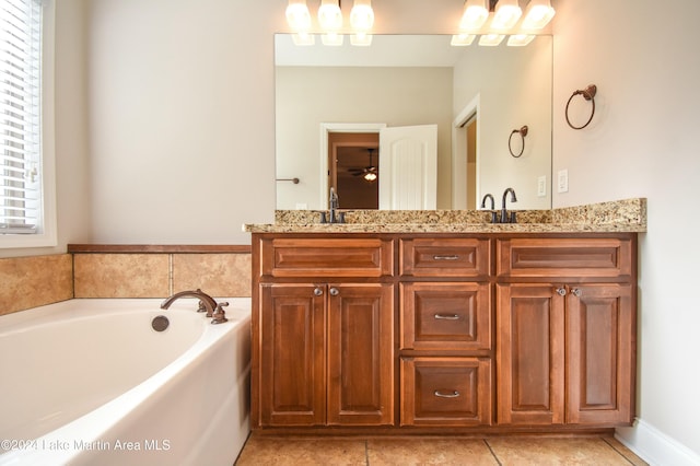 bathroom featuring a tub and vanity