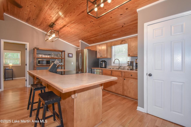 838 Bama Park Rd, Dadeville, AL 36853 - kitchen featuring stainless steel appliances, a sink, wood ceiling, lofted ceiling, and ornamental molding