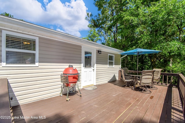 838 Bama Park Rd, Dadeville, AL 36853 - wooden terrace with outdoor dining area
