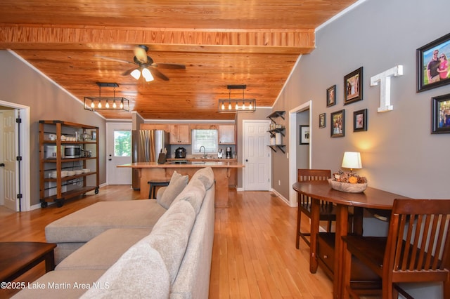 838 Bama Park Rd, Dadeville, AL 36853 - living room featuring wood ceiling, light wood-type flooring, ceiling fan, baseboards, and ornamental molding