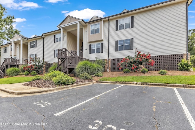 741 Lakeview Rdg, Dadeville, AL 36853 - view of property featuring uncovered parking and stairs