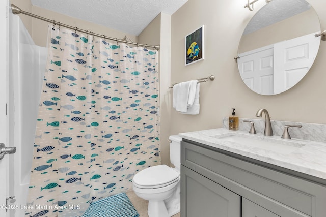 741 Lakeview Rdg, Dadeville, AL 36853 - full bathroom with a textured ceiling, vanity, curtained shower, and tile patterned floors