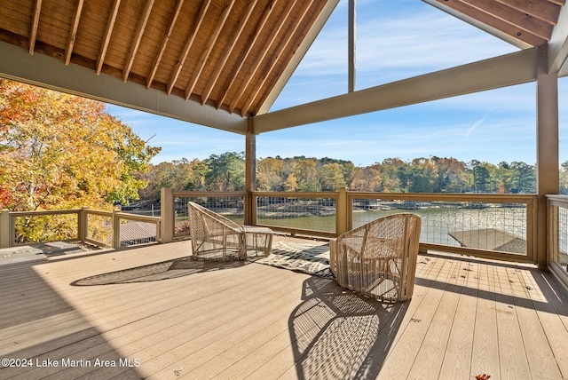 wooden deck with a water view