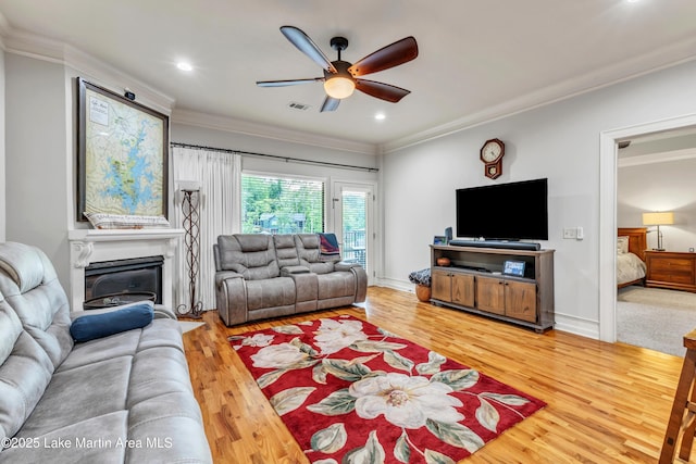 64 Stoneview Summit Ct Unit 5206, Dadeville, AL 36853 - living room with a ceiling fan, wood finished floors, crown molding, a glass covered fireplace, and recessed lighting