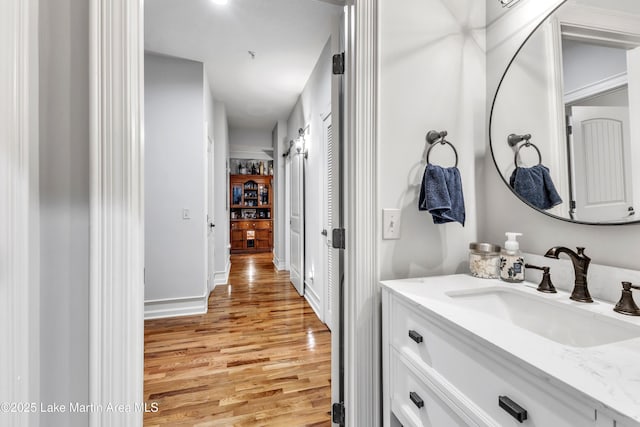 64 Stoneview Summit Ct Unit 5206, Dadeville, AL 36853 - bathroom featuring wood finished floors and vanity