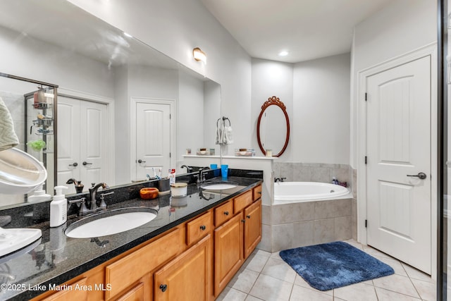 64 Stoneview Summit Ct Unit 5206, Dadeville, AL 36853 - bathroom featuring tile patterned floors, a bath, and double vanity