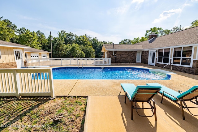 view of pool with a patio area