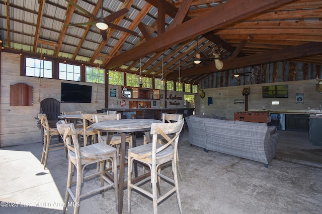 view of patio / terrace with outdoor dining space and a ceiling fan