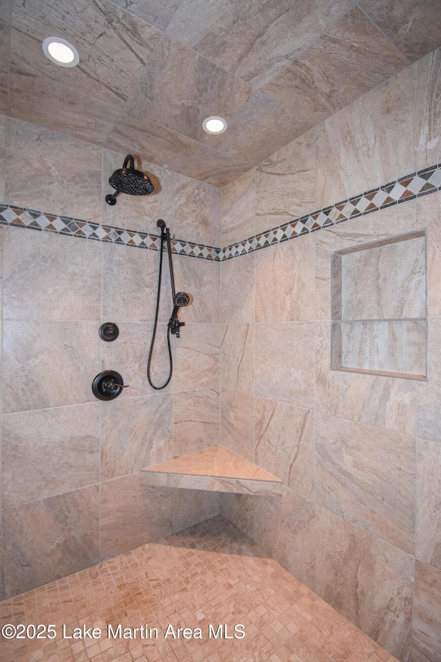 room details with a tile shower