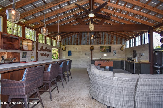 view of patio / terrace featuring outdoor wet bar and an outdoor kitchen