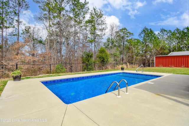 view of pool featuring a yard, a patio area, a fenced backyard, and a fenced in pool