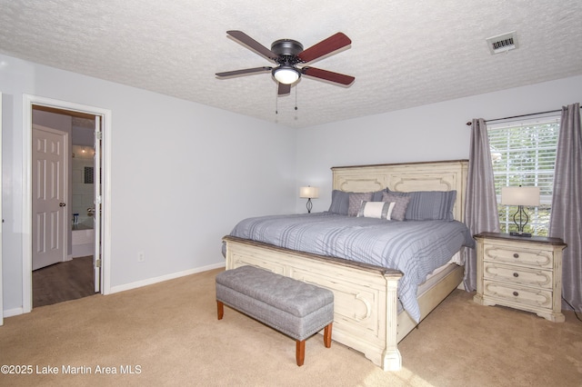 bedroom featuring carpet, visible vents, ceiling fan, a textured ceiling, and baseboards